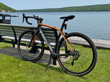 Used Trek Domane SL 5 2021 2021 Road & Gravel, Orange — image 1 of 3