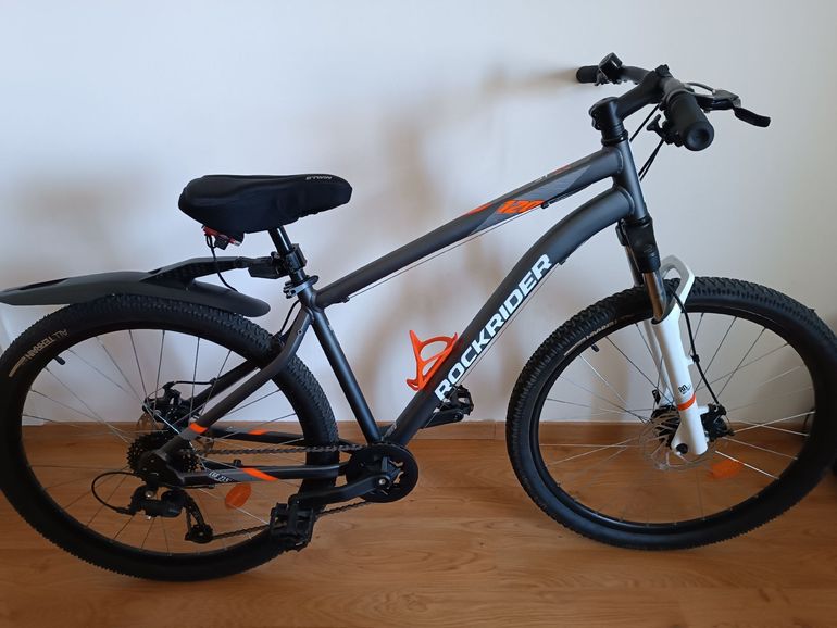 Used ROCKRIDER Mountainbike 27.5 Zoll ST120 Grau/Orange 2025 2025 Mountainbike, Light Gray, 27.5 — image 1 of 5