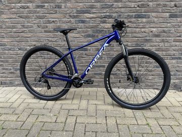 Used Orbea ONNA 50 2024 2024 Mountainbike, Blue, 27.5, 29 — image 1 of 4