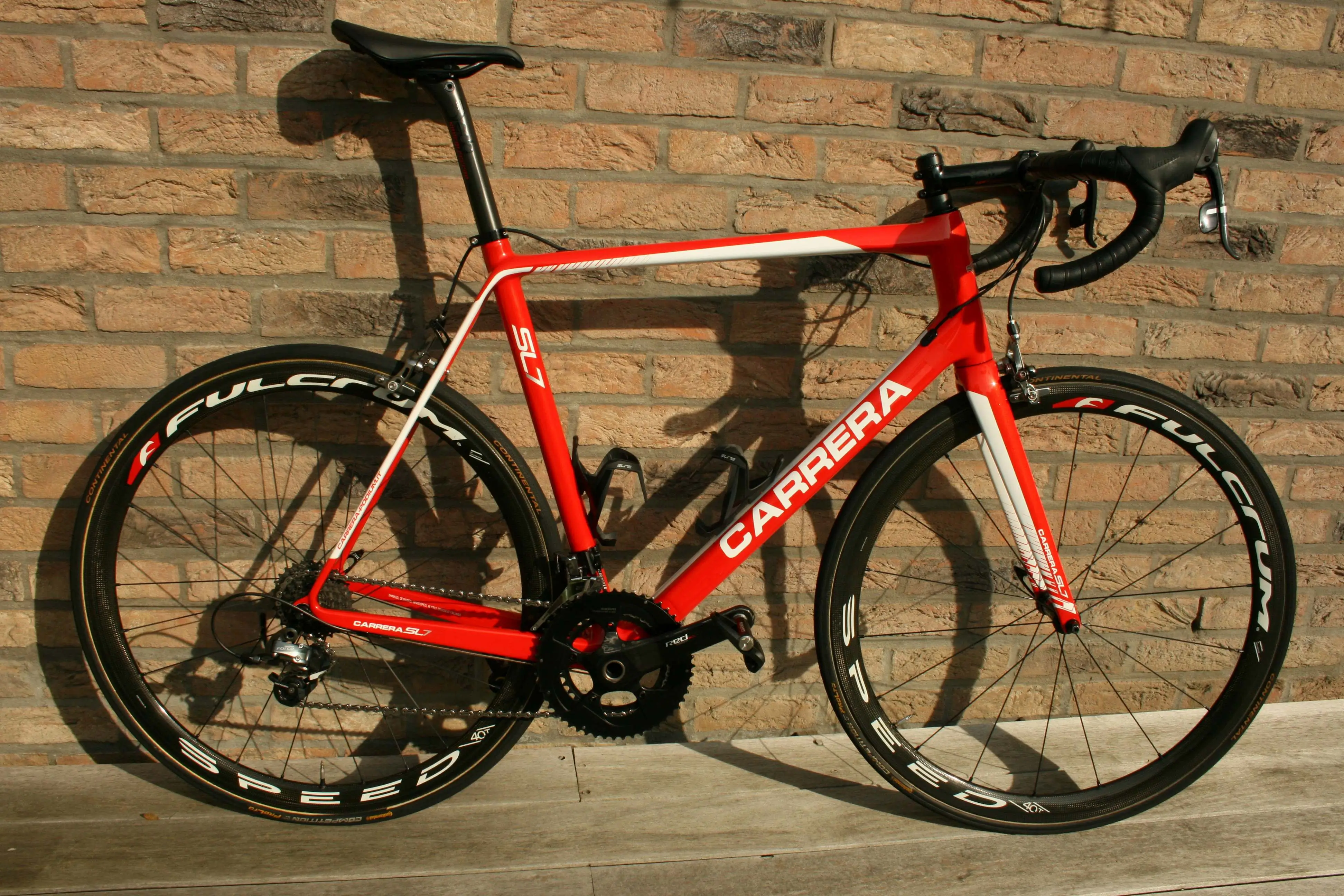 Red carrera cheap road bike