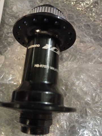 Used Shimano 105 HB-R7070 Front Hub 12x100mm 36H bike — image 5 of 7