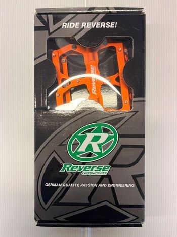 Used Reverse Components Escape Flat Pedals Orange bike — image 2 of 2