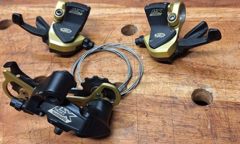 Used Shimano Deore LX gold special edition bike — image 8 of 11