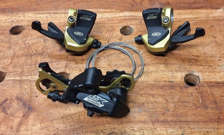 Used Shimano Deore LX gold special edition bike — image 1 of 11