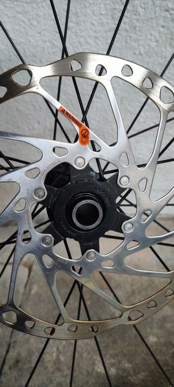 Used Shimano Front Wheel 29" Axle 110mm x 20mm with Tire and Insert bike — image 3 of 8