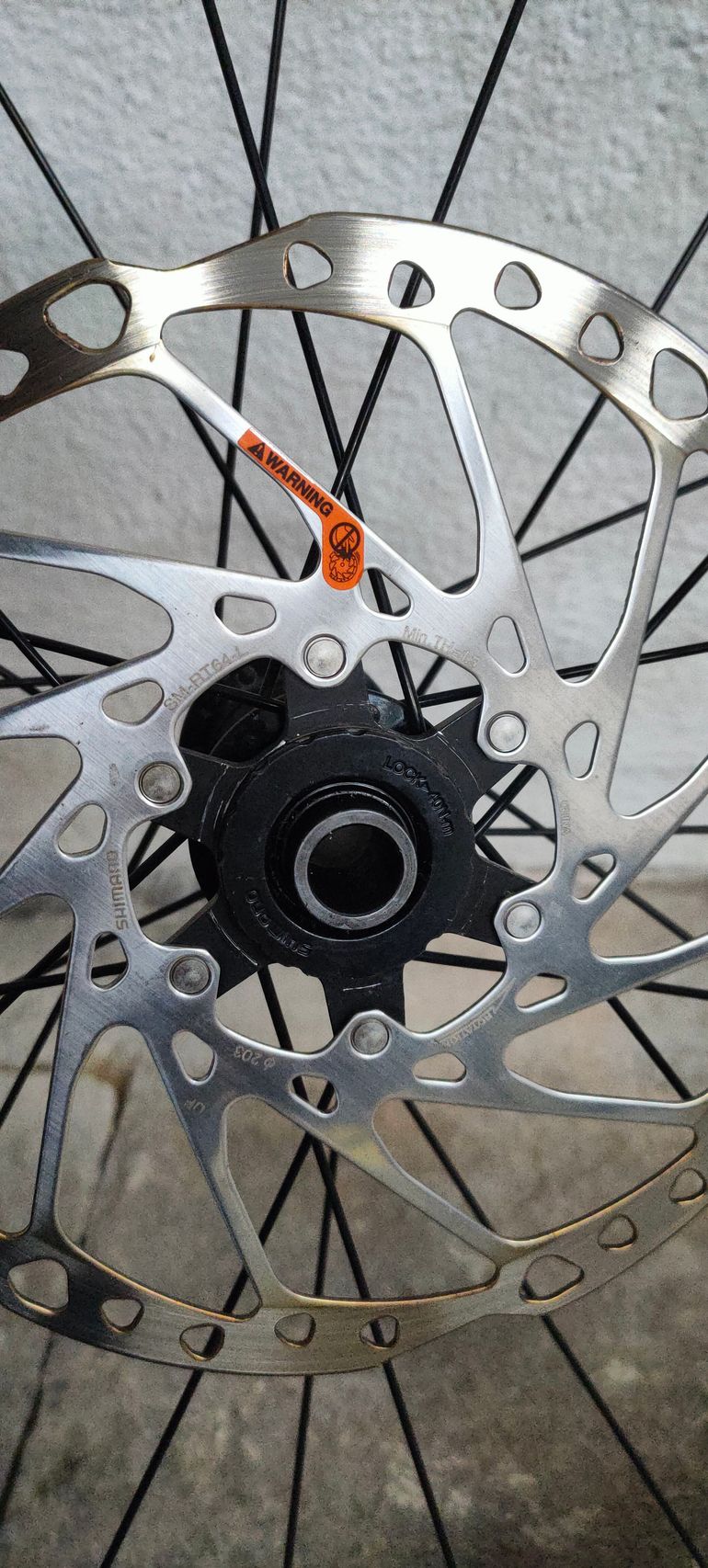 Used Shimano Front Wheel 29" Axle 110mm x 20mm with Tire and Insert bike — image 3 of 8