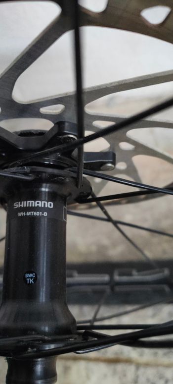 Used Shimano Front Wheel 29" Axle 110mm x 20mm with Tire and Insert bike — image 2 of 8