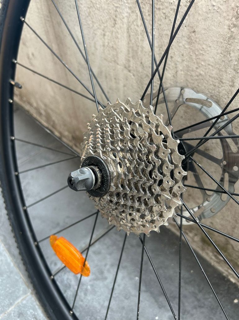 Used Triban Rear cWheel Complete with Gravel Tire 700c, Microshift Cassette, 160mm Brake bike — image 3 of 8
