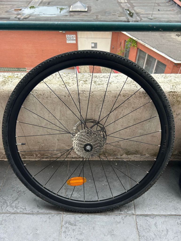 Used Triban Rear cWheel Complete with Gravel Tire 700c, Microshift Cassette, 160mm Brake bike — image 1 of 8