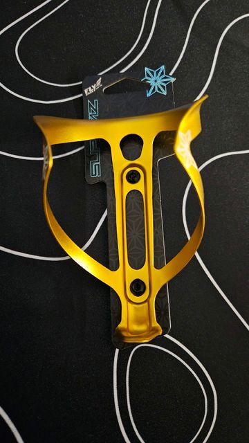 Tweedehands SUPACAZ Fly Cage Anodized bottle cage Gold 2024 Cycling Accessories