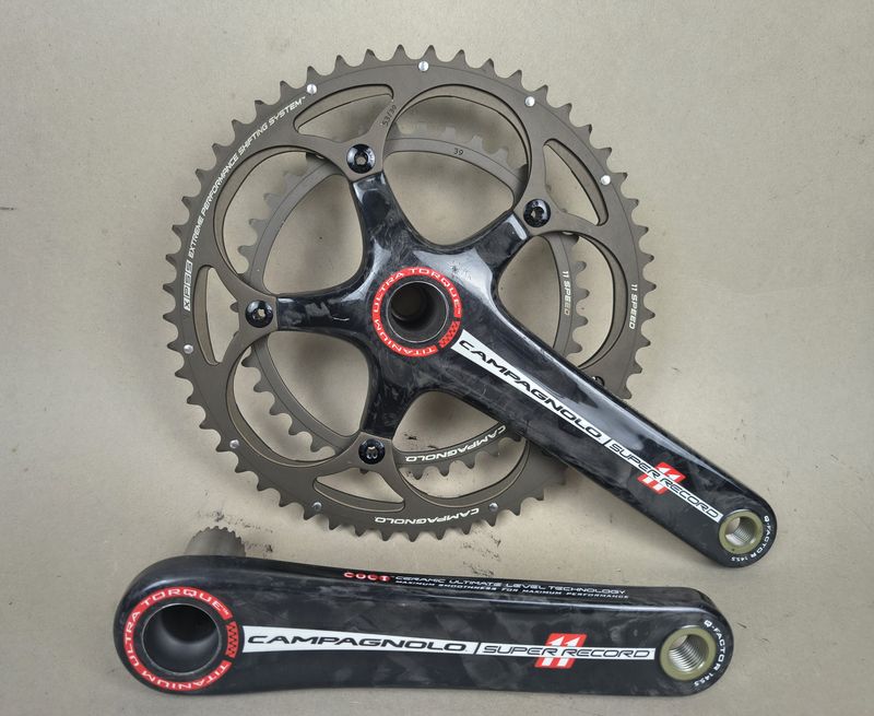 Tweedehands Campagnolo Super Record Ultra Torque TI Carbon Crankset 2x11-speed Drivetrain & Pedals