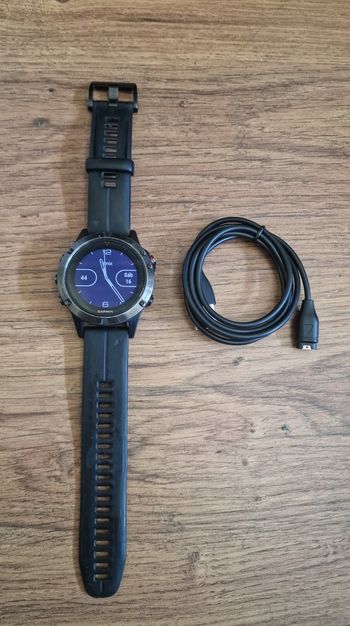 Used Garmin Fenix 5 GPS Multisport Watch bike