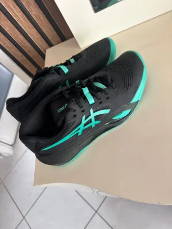 Used Asics Running Shoes bike