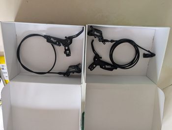 Used Sram Guide RE 4-piston brakes + 220mm & 200mm Rotors Complete Set 2023 bike