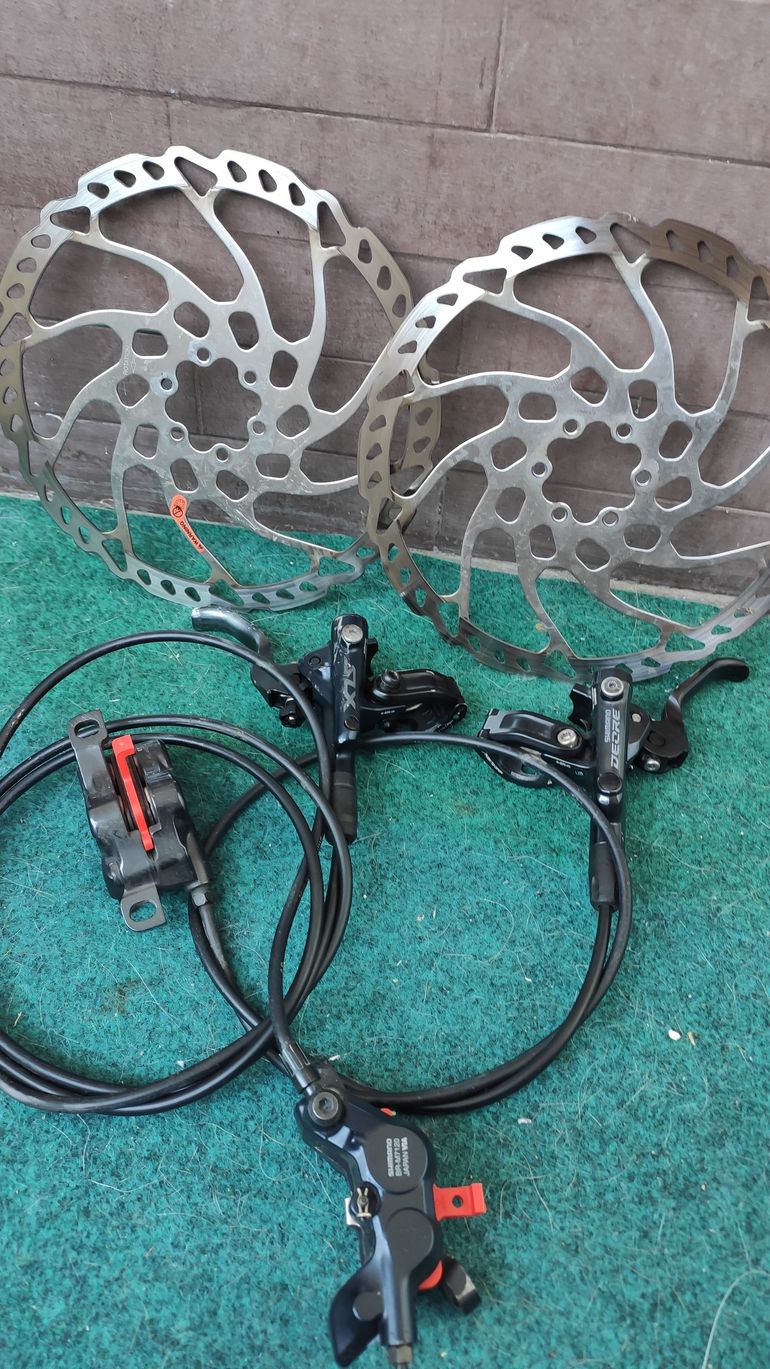 Used Shimano SLX M7100-M7120 and Deore M6100-M6120 Brakeset + 203mm Rotors bike — image 1 of 9
