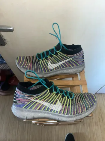 Used White Nike Free RN Motion Flyknit 2016 bike — image 2 of 5