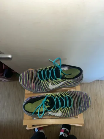 Used White Nike Free RN Motion Flyknit 2016 bike — image 3 of 5