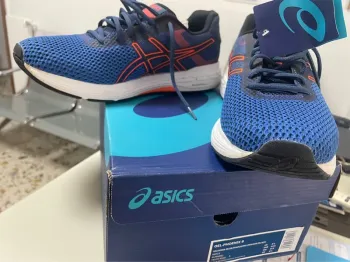 Used Asics Running Shoes bike