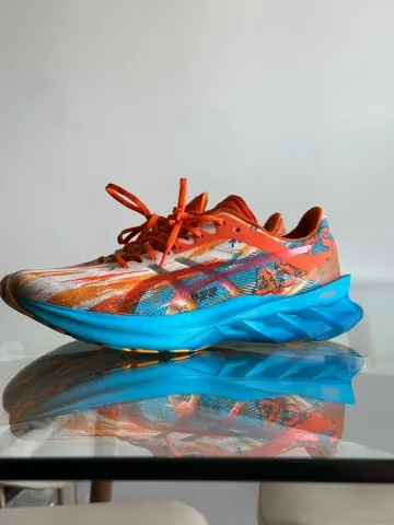 Used Orange Novablast Running Shoes