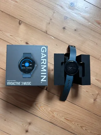 Used Garmin vivoactive 3 music bike