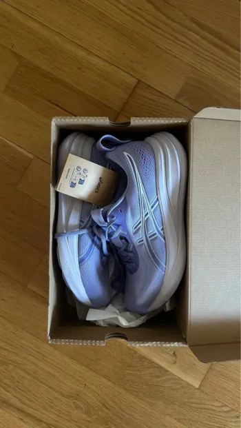 Gebrauchtes Asics Laufschuhe Größe 39, 5 bike