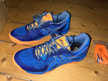 Used Orange Asics Sport Schuhe bike