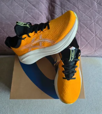 Used Asics sneakers bike