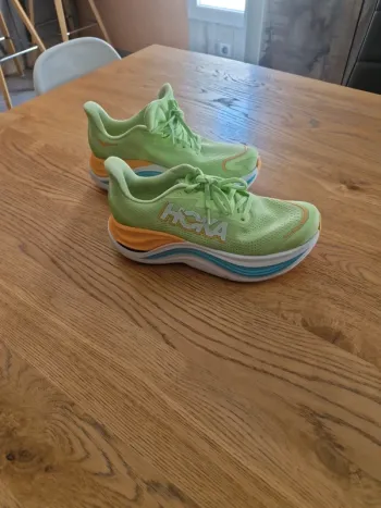 Used Orange Hoka Skyward X bike