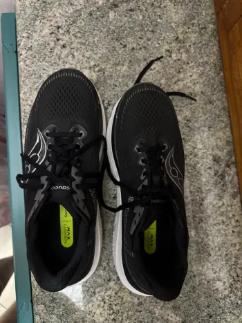 Used Saucony running shoes bike