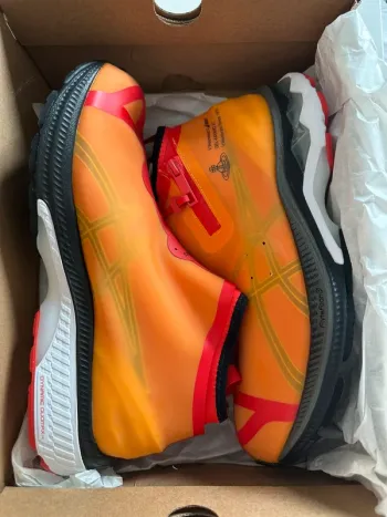 Orange Asics x Vivienne Westwood Gel-Kayano 27 bike d'occasion