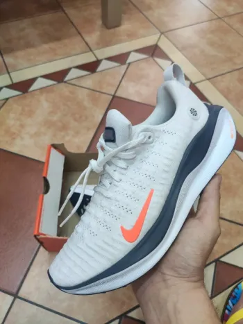 Used Orange Nike ReactX Infinity Run 4 bike