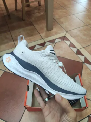 Used Orange Nike ReactX Infinity Run 4 bike — image 2 of 8
