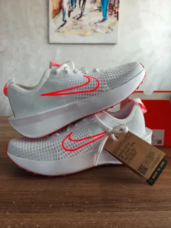 White Nike Interact Run bike d'occasion
