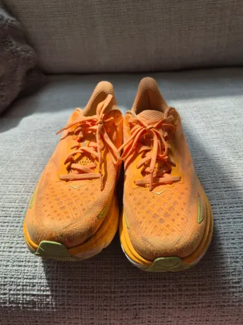 Used Orange HOKA Running Shoes Size 44 bike — image 3 of 5