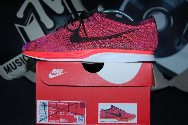 Used Orange Flyknit Racer bike — image 3 of 15