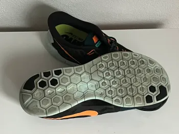Used Orange Nike Free RN 5.0 bike — image 5 of 6
