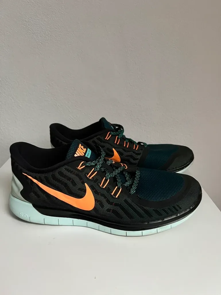 Used Orange Nike Free RN 5.0 bike — image 3 of 6