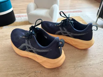 Used Orange Novablast Running Shoes