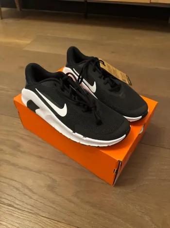 Used Nike Flex Train Running Shoes