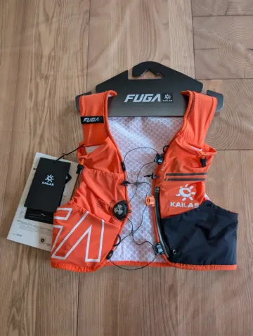 Used Orange Fuga Air 8 Running Accessories