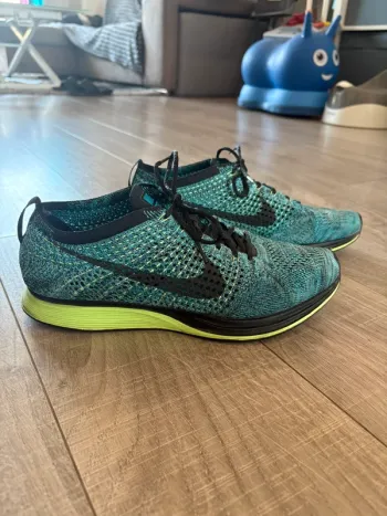 Used Nike Flyknit Racer Running Shoes