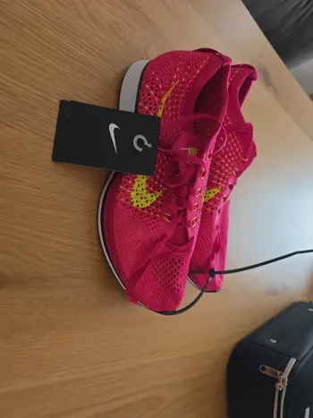 Käytetty Nike Air Flyknit Racer Running Shoes
