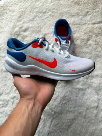 Used Orange Revolution 7 Running Shoes