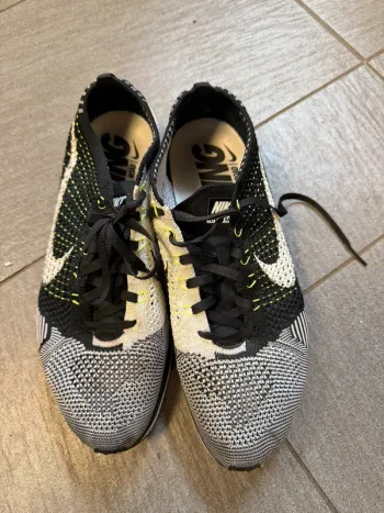 Used White Flyknit Racer Running Shoes