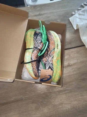 Used Orange Noosa Tri 16 Running Shoes
