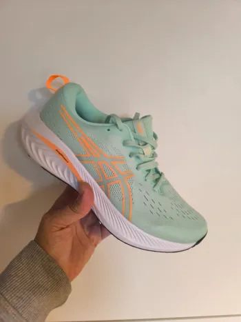 Used Orange Excite 10 Running Shoes