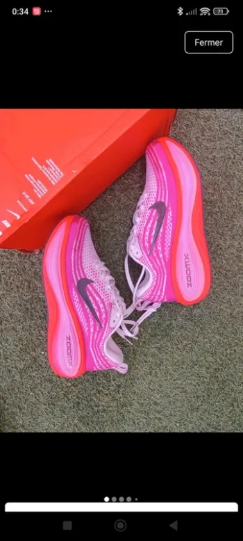 Used Orange Vomero Plus Running Shoes