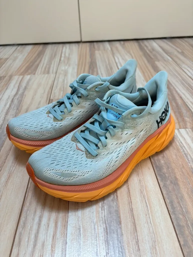 Used Orange Hoka Clifton 8 bike — image 1 of 7