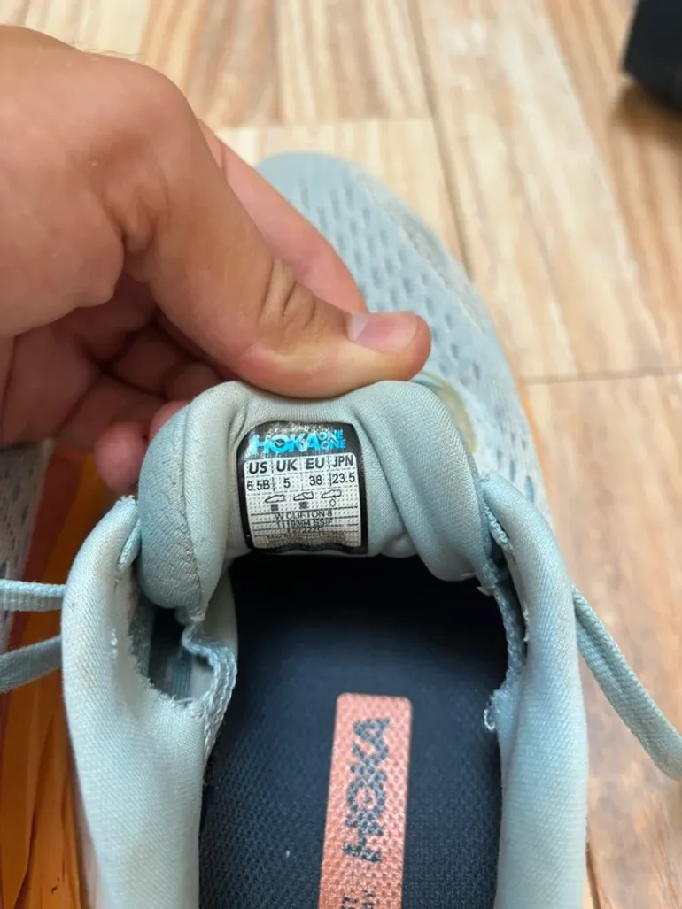 Used Orange Hoka Clifton 8 bike — image 6 of 7