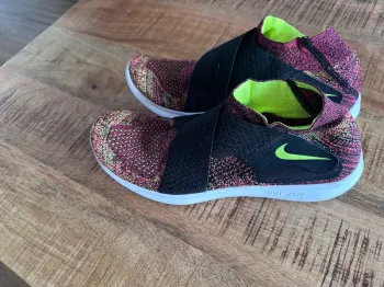 Used Nike Free Run Motion Flyknit bike — image 1 of 4